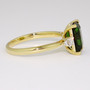18ct gold emerald cut green tourmaline and round brilliant cut diamond ring side 18ct gold emerald cut green tourmaline and round brilliant cut diamond ring side