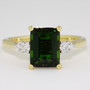 18ct gold emerald cut green tourmaline and round brilliant cut diamond ring 18ct gold emerald cut green tourmaline and round brilliant cut diamond ring