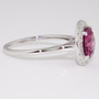 Platinum round cut malaya garnet and diamond halo ring side