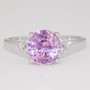 Platinum unheated oval cut opalescent pink sapphire and diamond ring