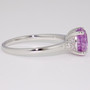 Platinum unheated oval cut opalescent pink sapphire and diamond ring side