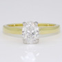 18ct gold and platinum oval cut certificated D colour diamond solitaire ring