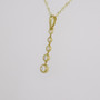 9ct gold five rubover-set diamond bubble necklace side