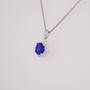 Sterling silver blue and white CZ halo pendant side