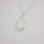 Sterling silver half engraved oval locket side