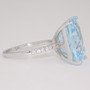 Unique 9ct white gold fancy cut blue topaz and diamond ring side