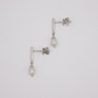 18ct white gold oval Scottish freshwater pearl earrings with diamond caps and diamond-set bars side