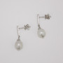 18ct white gold oval Scottish freshwater pearl earrings with diamond caps and diamond-set bars side