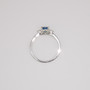 Platinum round cut aquamarine and round brilliant cut diamond ring top