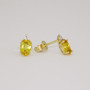 9ct gold oval cut heliodor and round brilliant cut diamond stud earrings side