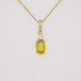 9ct gold oval cut heliodor and round brilliant cut diamond pendant