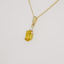 9ct gold oval cut heliodor and round brilliant cut diamond pendant side