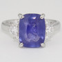Platinum rectangular cushion cut Ceylon sapphire and round brilliant cut diamond ring