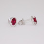 18ct white gold oval cut ruby and round brilliant cut diamond cluster stud earrings side