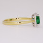 18ct gold emerald and diamond cluster ring side