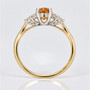 9ct gold oval cut Imperial topaz and round brilliant cut diamond ring profile
