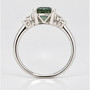 Platinum unheated radiant cut green sapphire and round brilliant cut diamond ring profile