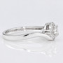 Platinum round brilliant cut diamond cluster twist ring side
