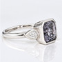 Platinum rubover-set radiant cut grey spinel and pear cut diamond ring side