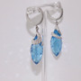 9ct white gold briolette cut blue topaz and diamond swirl drop earrings side