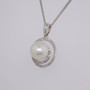 9ct white gold pearl and diamond swirl pendant side