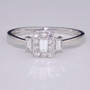 Platinum baguette and round brilliant cut diamond cluster ring