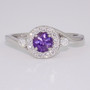 Platinum natural purple sapphire and diamond twist ring