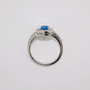 18ct white gold pear cut blue topaz and round brilliant cut diamond cluster ring with diamond-set shoulders top