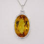 9ct white gold oval cut citrine and diamond pendant