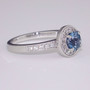 Platinum aquamarine and diamond halo ring side