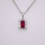 18ct white gold emerald cut ruby and baguette and round cut diamond pendant