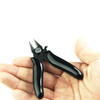 UD Mini Diagonal Pliers in the hand