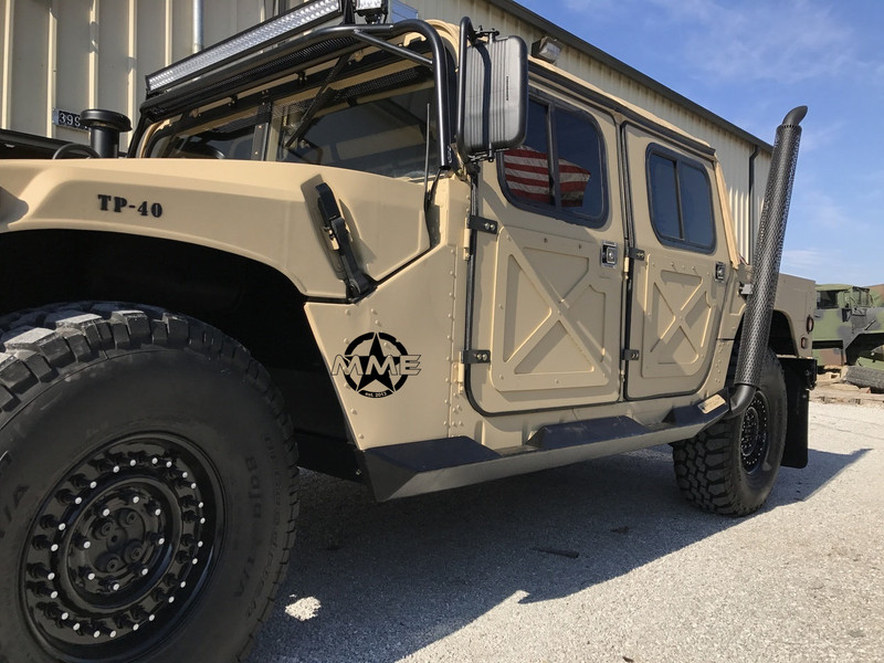 HMMWV HEAVY DUTY ROCK SLIDERS With Step Midwest Military Equipment HMMWV HEAVY DUTY ROCK SLIDERS With Step Midwest Military Equipment
