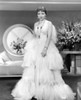 Claudette Colbert In Gilded Lily 1935 In Travis Banton Gown Trimmed In Vulture Feathers Photo Print - Item # VAREVCPBDCLCOEC062H