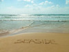 Word Seaside written in sand on the beach Poster Print by  Assaf Frank - Item # VARPDXAF20150529296