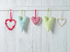 Hearts hanging on wooden background Poster Print by  Assaf Frank - Item # VARPDXAF20141123081