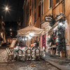 Sidewalk cafe on narrow streets of Rome, Italy Poster Print by  Assaf Frank - Item # VARPDXAF20141109140C01