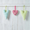 Hearts hanging on wooden background Poster Print by  Assaf Frank - Item # VARPDXAF20141123072