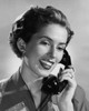 Close-up of a young woman talking on the telephone Poster Print - Item # VARSAL2559293