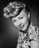 Studio portrait of young woman smiling Poster Print - Item # VARSAL25510066B