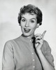 Studio portrait of young woman gesturing Poster Print - Item # VARSAL25511199
