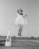 Cheerleader with megaphone jumping Poster Print - Item # VARSAL255422383
