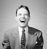 Young man laughing Poster Print - Item # VARSAL255419231