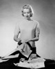 Studio shot of young woman sewing Poster Print - Item # VARSAL25542073