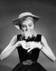 Close-up of a young woman smelling flowers Poster Print - Item # VARSAL25541906