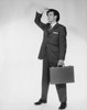 Businessman carrying briefcase Poster Print - Item # VARSAL2555365