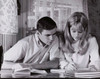 Teenage couple studying Poster Print - Item # VARSAL25517536