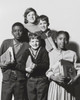 Schoolboys and schoolgirls holding books and smiling Poster Print - Item # VARSAL25518014