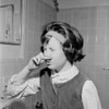 Young girl grimacing in front of bathroom mirror Poster Print - Item # VARSAL255421972