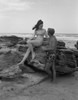 Young couple relaxing on beach Poster Print - Item # VARSAL255424764